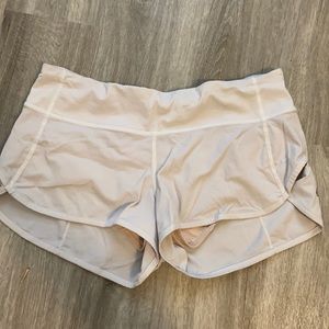 White Lululemon running shorts